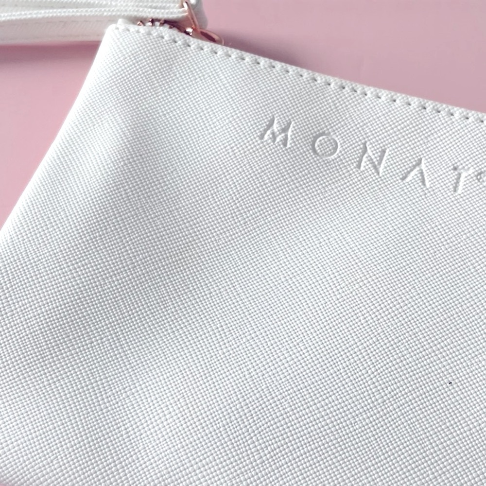 Monat White Faux Leather Wristlet